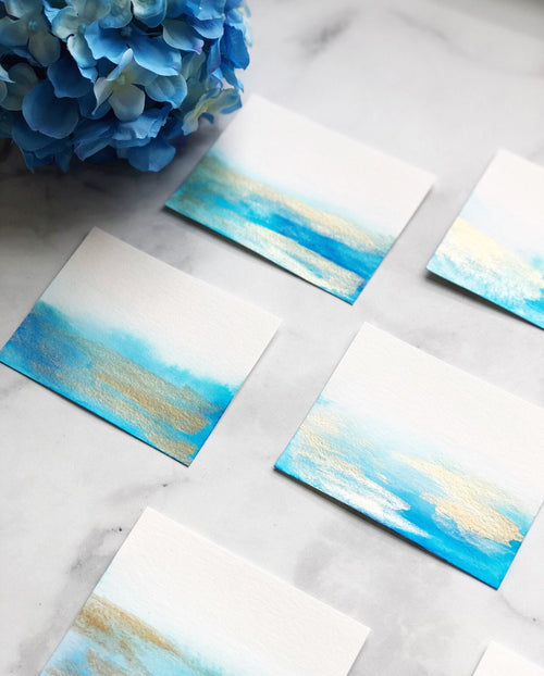Blank Blue Watercolor Wash Wedding Place Cards with Gold Accents